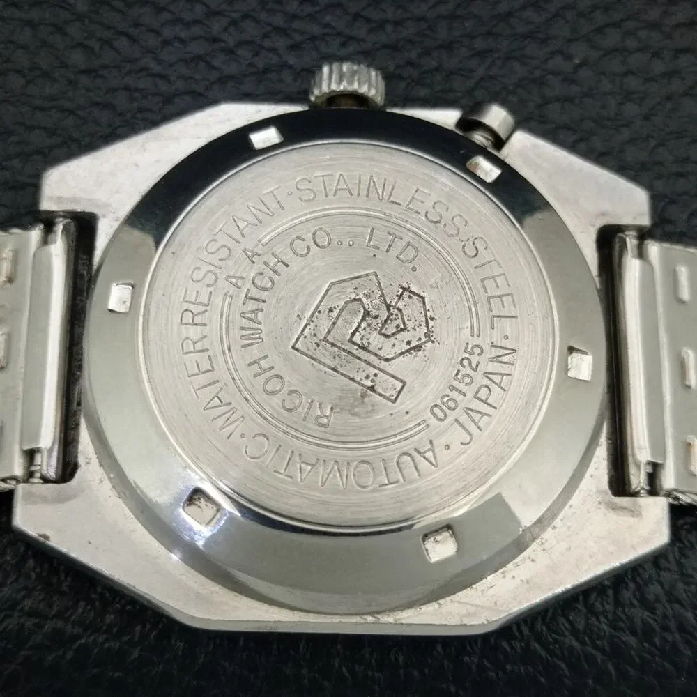 Vintage 1986 Ricoh Automatic Mens Silver Watch W/daydate & Green accents
